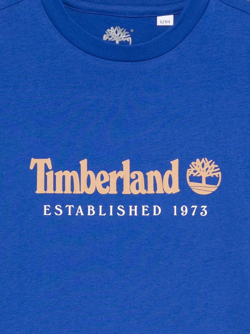 T-shirt per bambino Timberland Kids blu con stampa logo sul davanti T60968 829 TIMBERLAND KIDS 