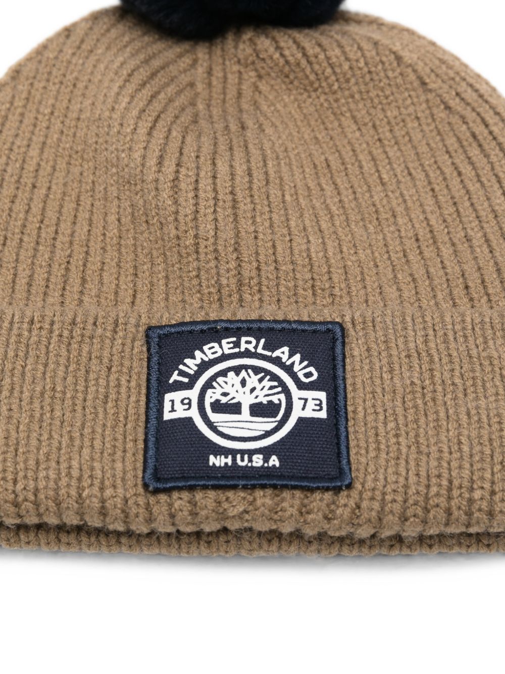 Cappello per bambino Timberland Kids verde con pompon T61095 659 TIMBERLAND KIDS 
