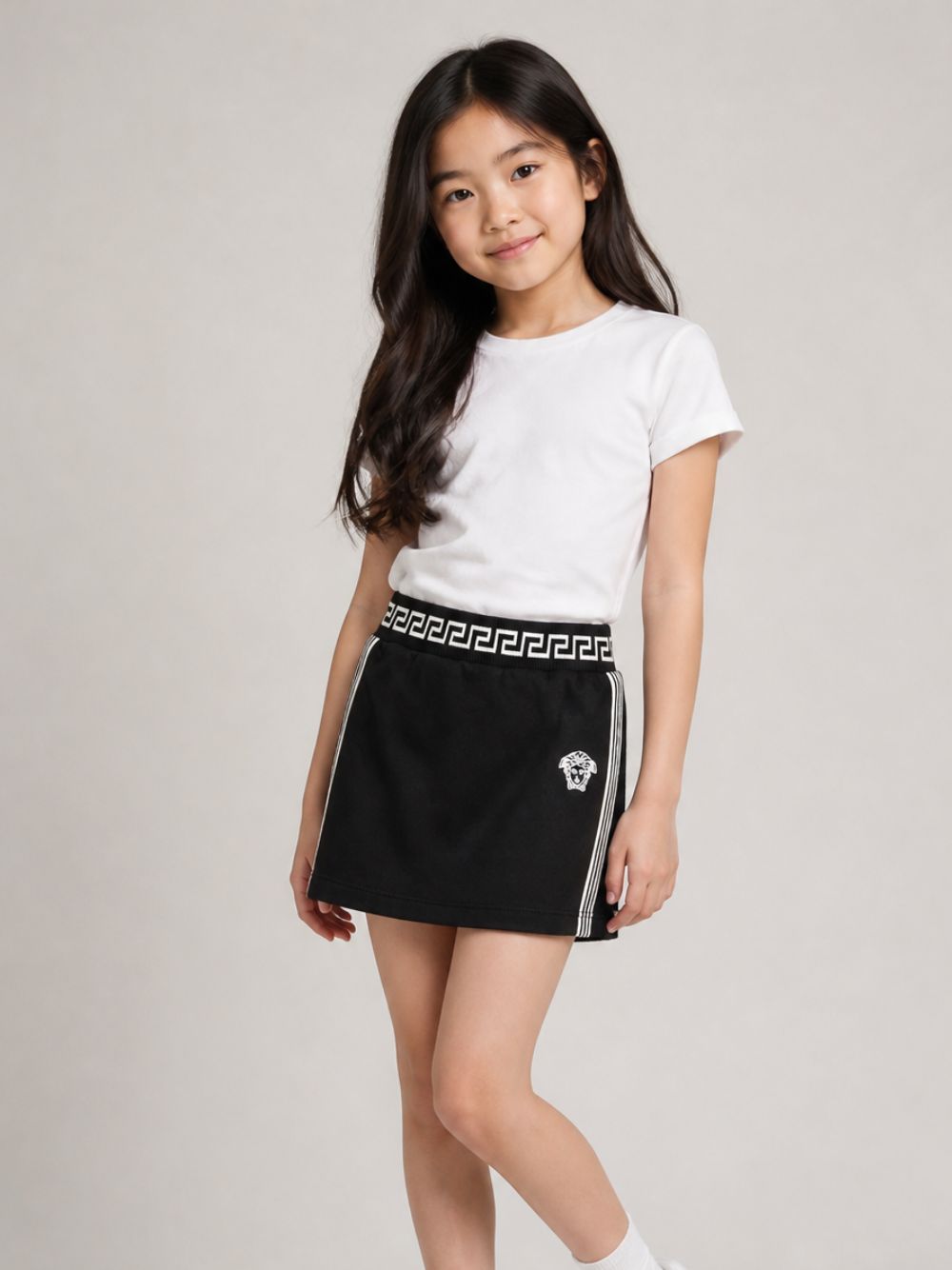 Gonna per bambina Versace Kids nera con ricamo Medusa sul davanti 10228971A11652 2B020 VERSACE KIDS 