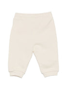 Pantaloni sportivi per neonato Versace Kids beige con dettaglio logo 10251531A18127 2YE00 VERSACE KIDS 