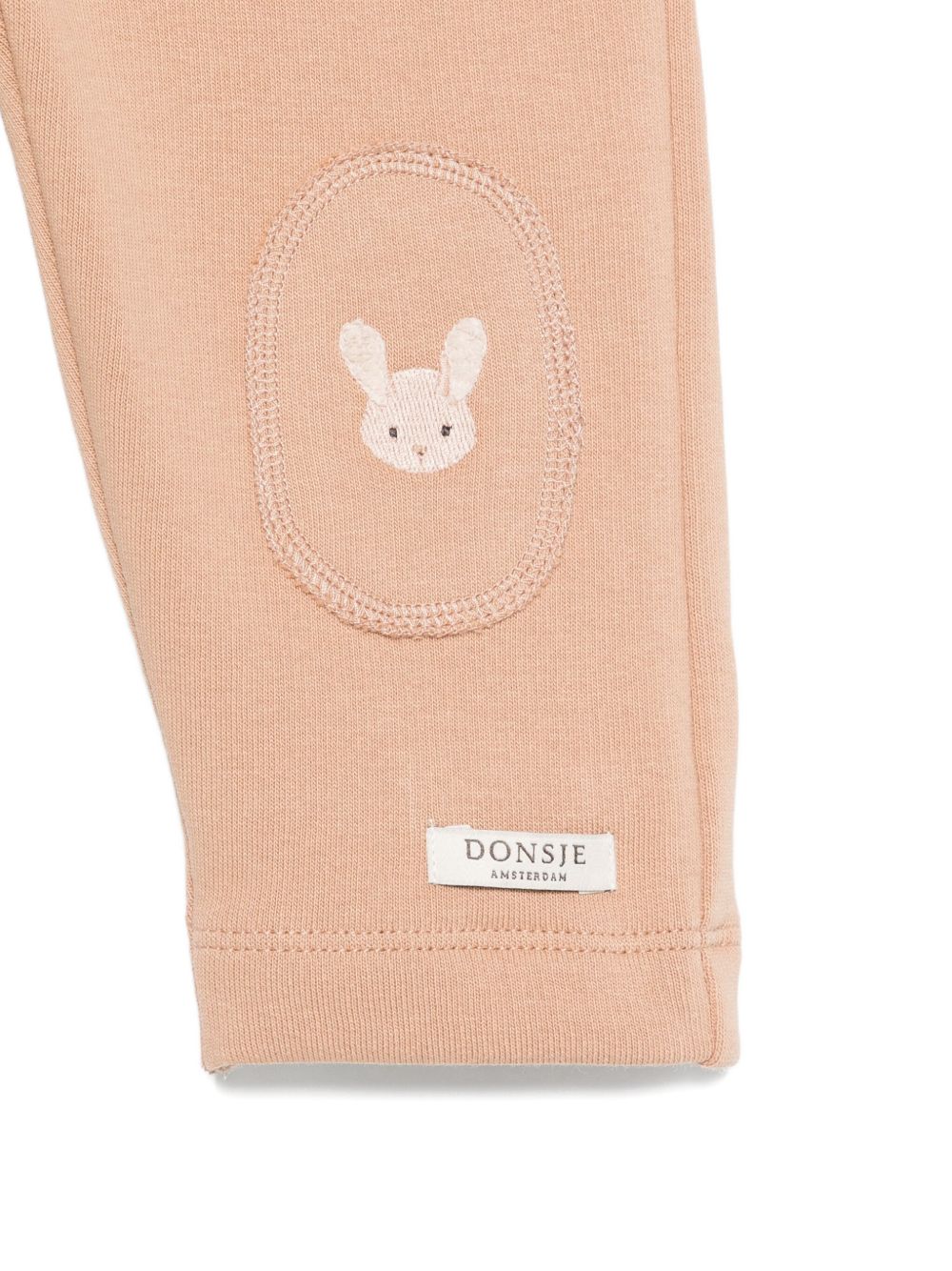 Pantaloni per neonati Donsje Kids beige con ricamo coniglietti 3040703 00035 DONSJE KIDS 