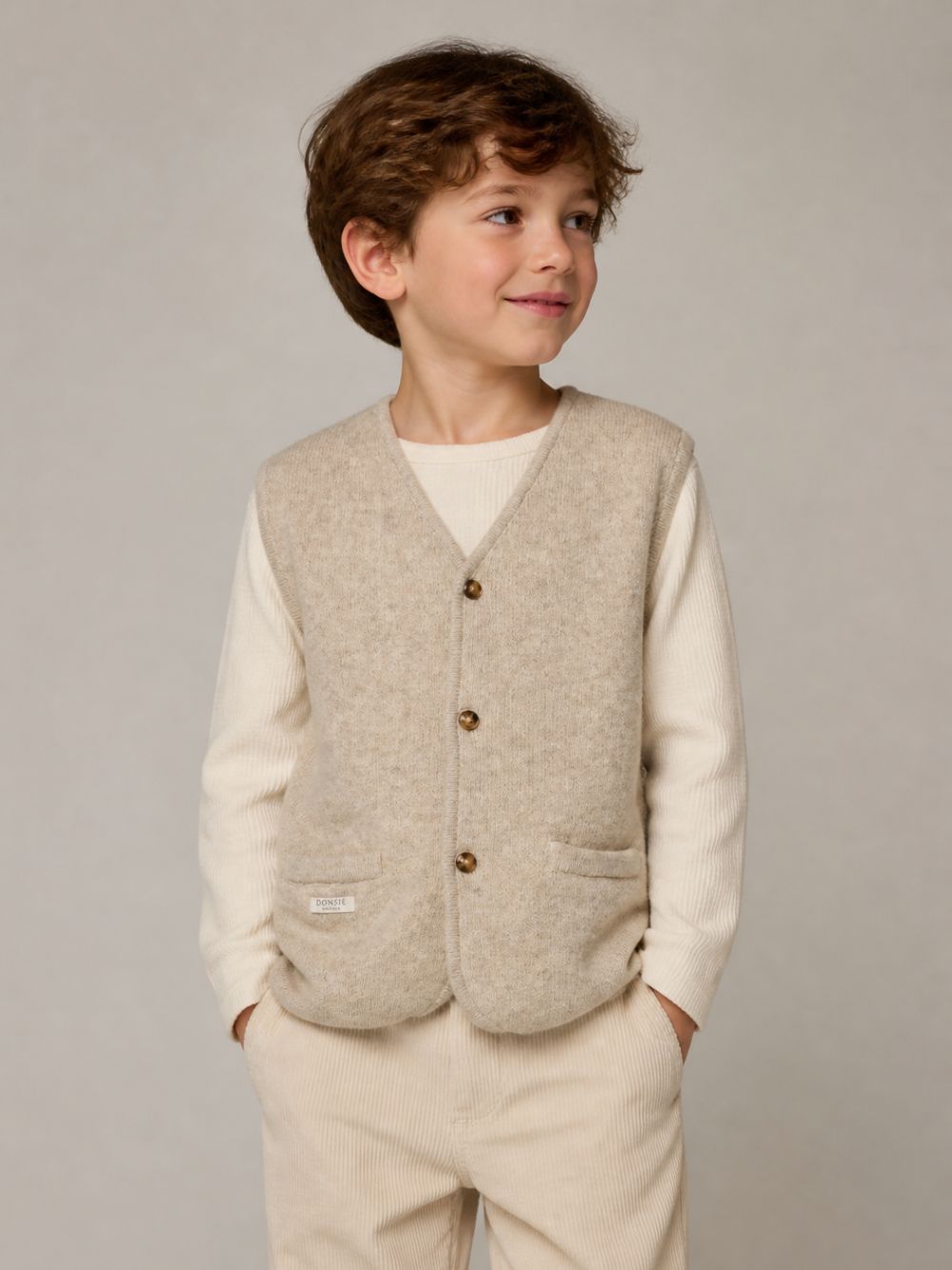 Gilet in maglia per bambini Donsje beige con scollo a V 4101400 00182 DONSJE KIDS 