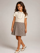 Abito per bambina Gucci Kids beige con logo GG ricamato 866658XWA2R 9118 GUCCI KIDS 