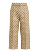 Pantaloni per bambina Gucci Kids beige con logo GG all-over 866669XWA9A 2061 GUCCI KIDS 