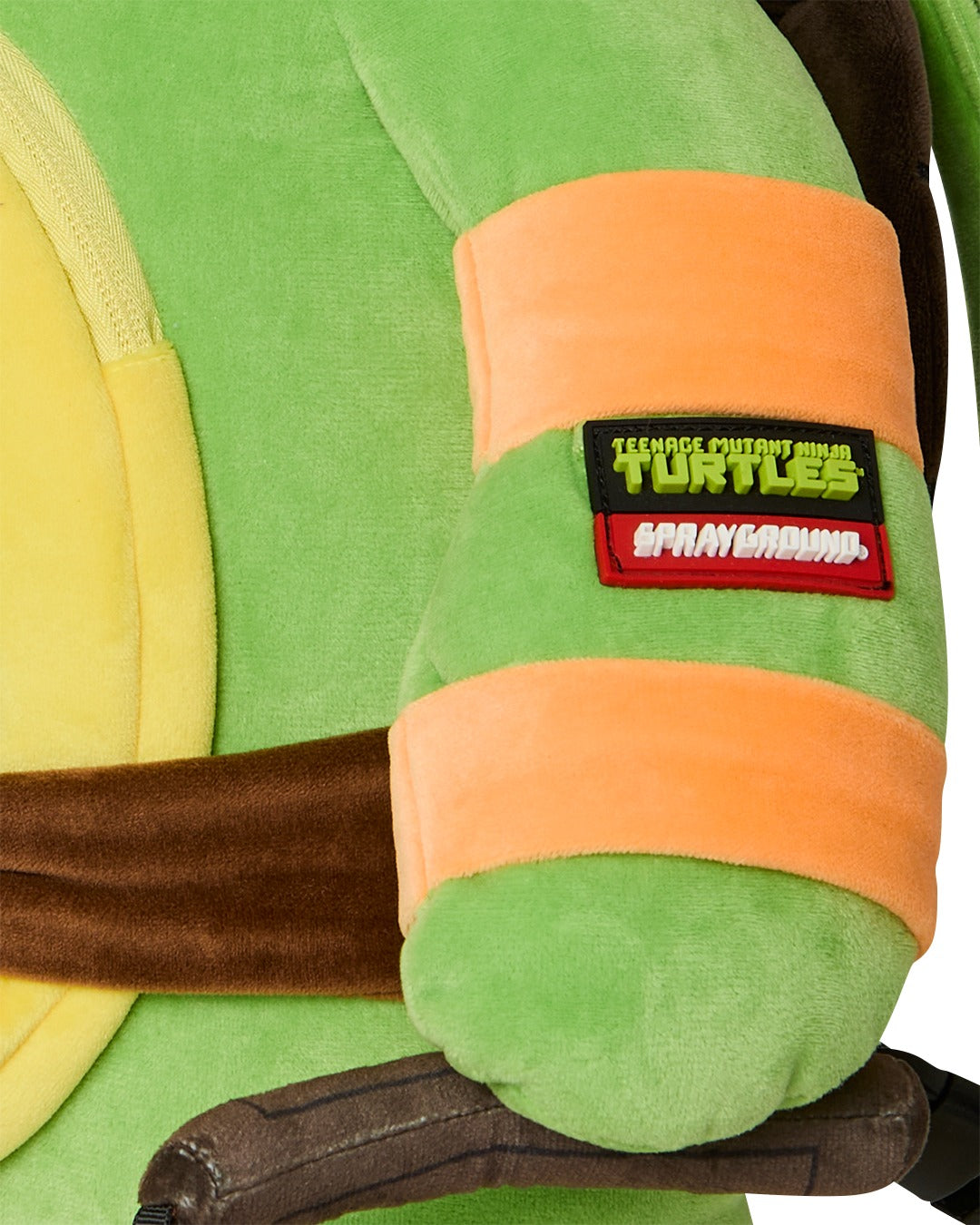 Zaino TMNT Michelangelo Moneybear per bambini Sprayground Kid verde con dettaglio logo sul davanti 910B7045 NSZ SPRAYGROUND KIDS 