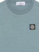 T-shirt per bambino Stone Island Kids azzurro con logo sul davanti L2S162100003S0047 V004B STONE ISLAND KIDS 