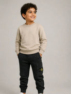 Pantaloni cargo per bambino Stone Island Kids nero con applicazione sulla gamba L2S166200002S0A20 V0029 STONE ISLAND KIDS 