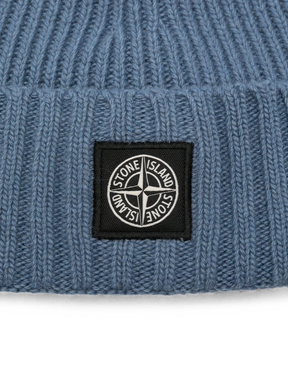 Berretto per bambino Stone Island Junior blu con applicazione L2S16N100003S00M3 V004B STONE ISLAND KIDS 