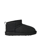 Stivali Ultra Mini per bambina UGG Kids neri con finitura idrorepellente 1130750K BLK UGG KIDS 