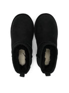 Stivali Ultra Mini per bambina UGG Kids neri con finitura idrorepellente 1130750K BLK UGG KIDS 