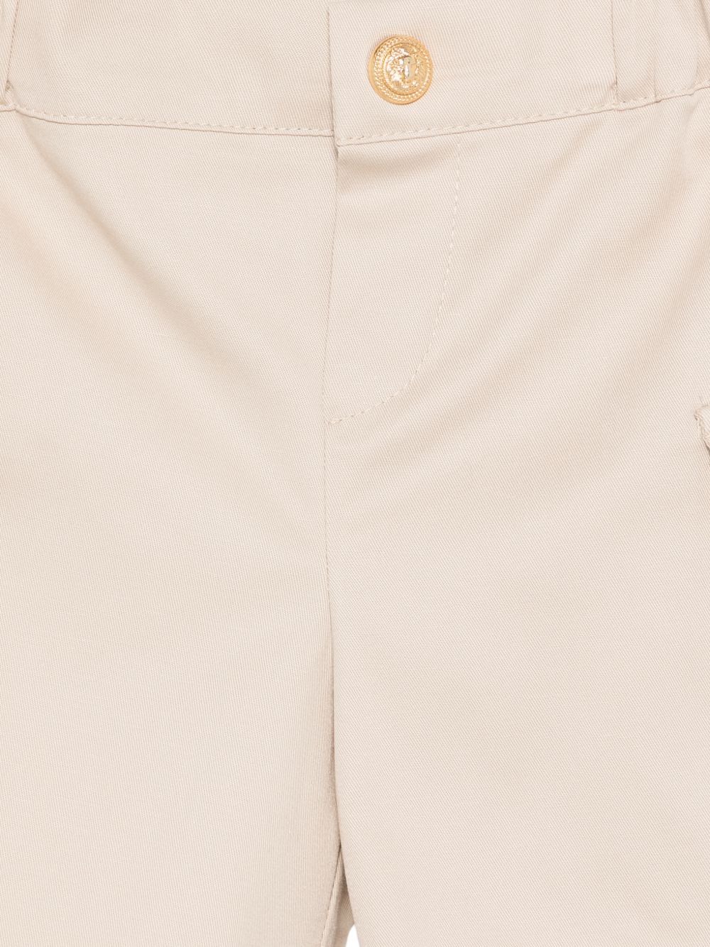 Shorts per neonato Balmain Kids beige con bottoni dorati BY6579 G0197 107 BALMAIN KIDS 