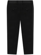 Pantaloni per bambino Dolce & Gabbana Kids nero con logo DG jacquard L44P04 FJBAK N0000 DOLCE & GABBANA KIDS 