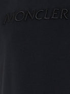 T-shirt per bambino Moncler Enfant nera con logo goffrato L19548C0000989AT9 999 MONCLER KIDS 