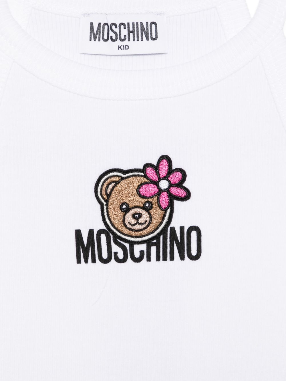 Top per bambina Moschino Kids bianca con stampa Teddy Bear  con fiore HDM06ZLBA39 10101 MOSCHINO KIDS 