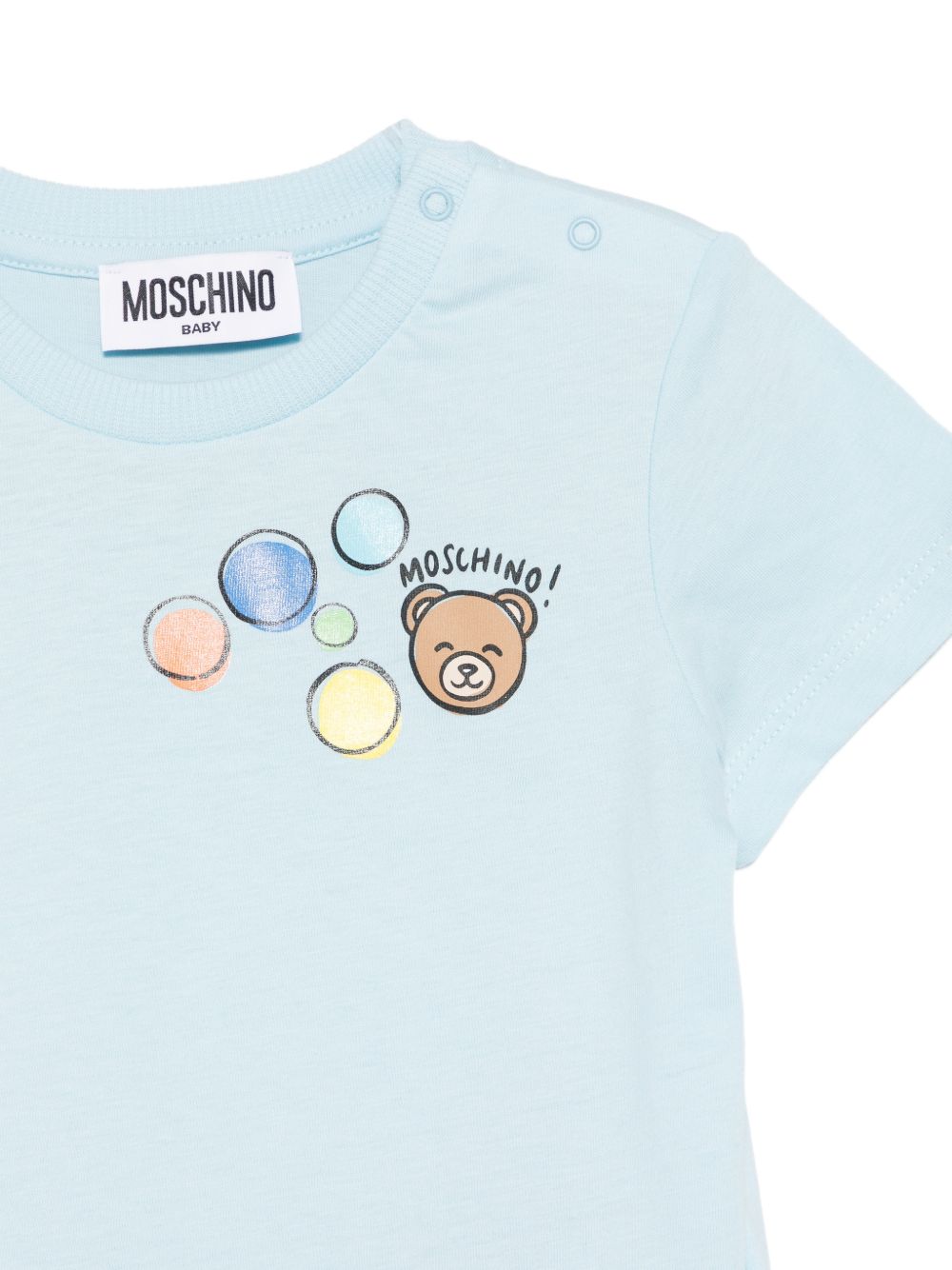 T-shirt per neonato Moschino Kids azzurra con stampa grafica M5M047LAA03 40304 MOSCHINO KIDS 