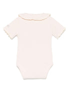 Body per neonata Donsje Bettie rosa con dettagli in pizzo - Rubino Kids