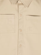 Camicia per neonato Calvin Klein Kids beige con ricamo logo sulla tasca - Rubino Kids