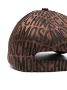 Cappello da baseball con logo jacquard per bambina Moschino Kids marrone con tesa curva - Rubino Kids