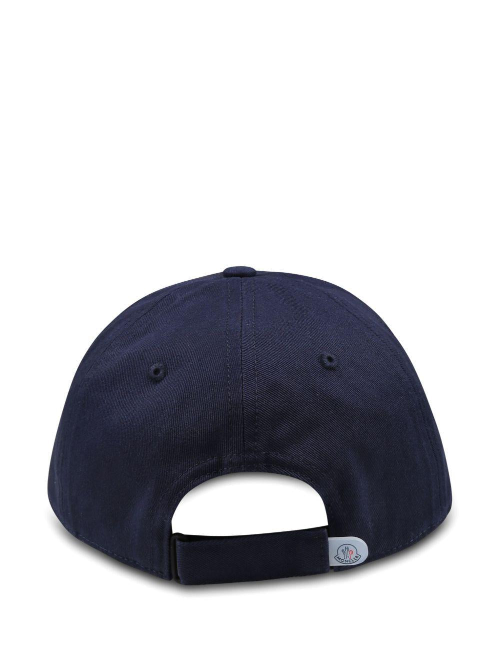 Cappello per bambino Moncler Enfant blu con occhielli - Rubino Kids