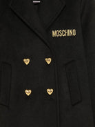 Cappotto con bottoni a cuore per bambina Moschino Kids nero con chiusura a doppiopetto - Rubino Kids