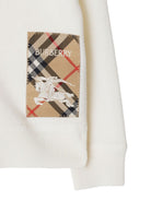 Cardigan Check Label per neonato Burberry Kids bianco con scollo a V - Rubino Kids