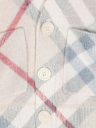 Cardigan in lana con motivo check per neonata Burberry Kids con scollo a V - Rubino Kids