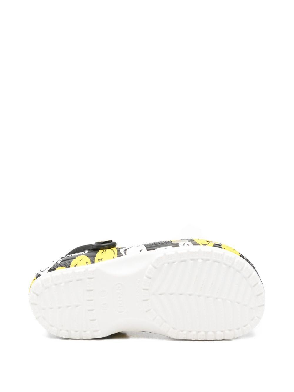 Ciabatte per bambini Crocs Kids multicolore con design Smiley Classic K - Rubino Kids