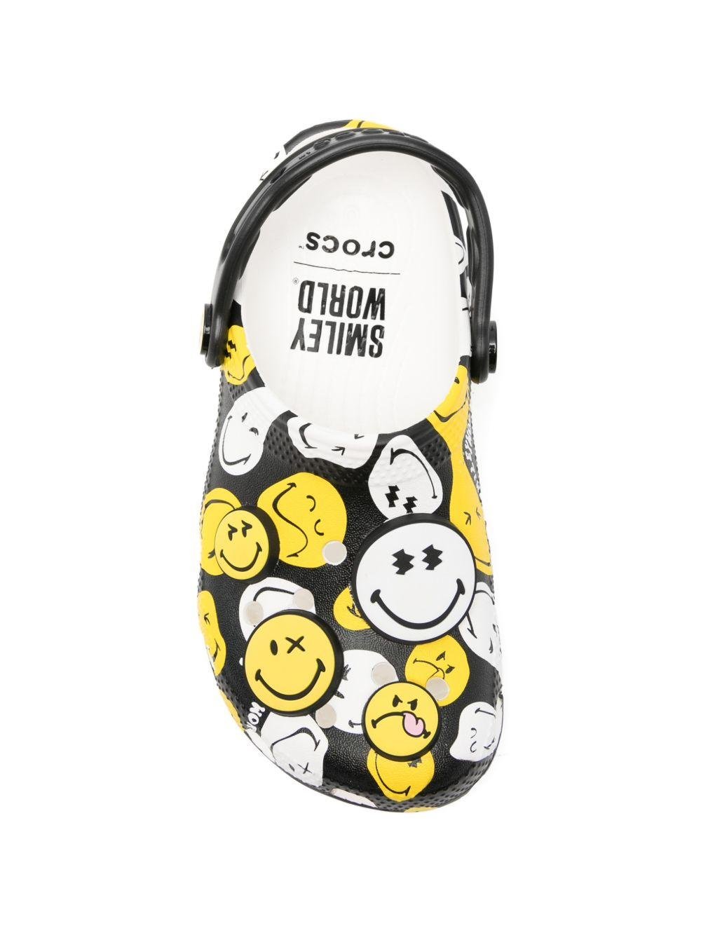 Ciabatte per bambini Crocs Kids multicolore con design Smiley Classic K - Rubino Kids