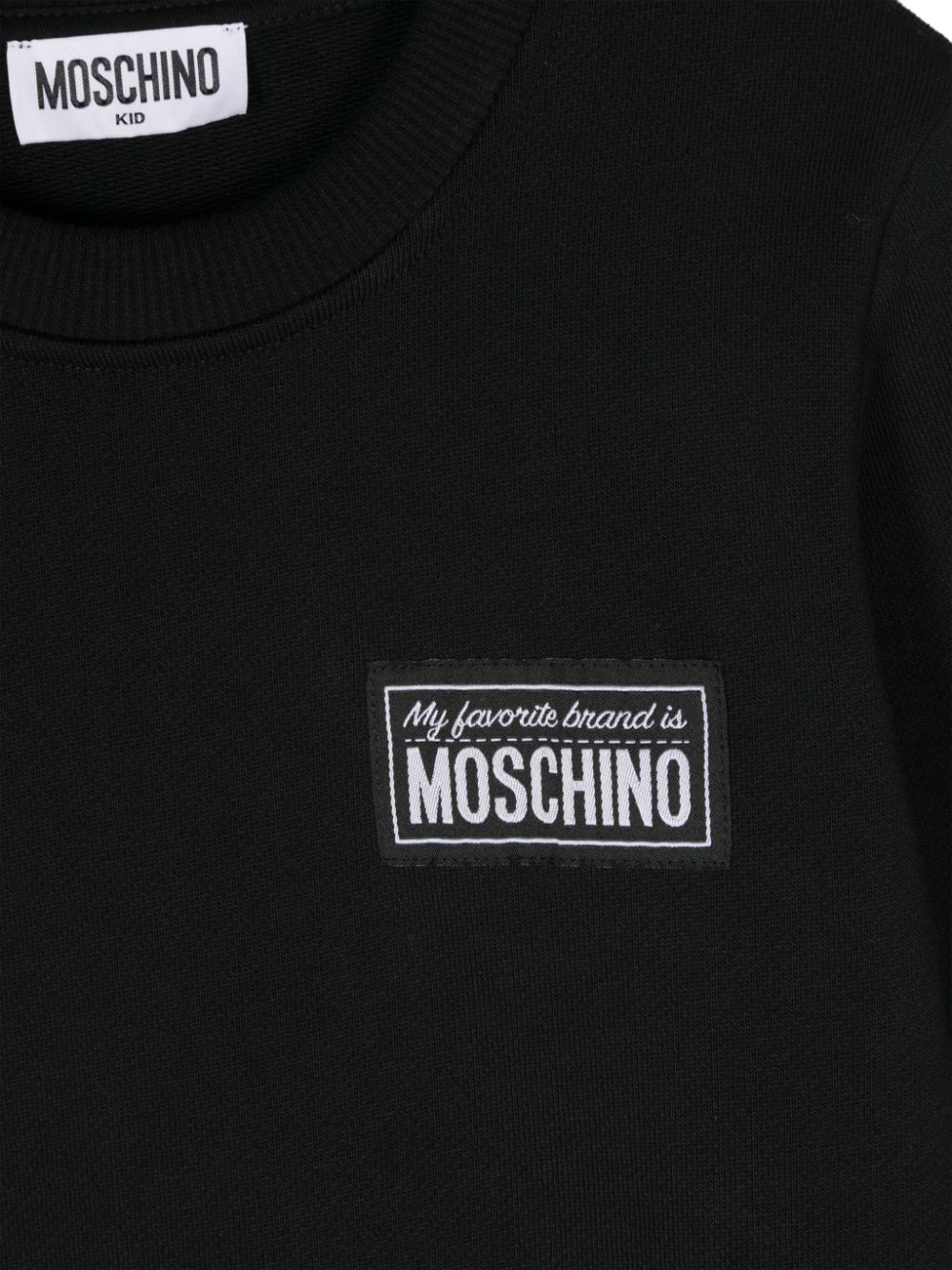 Felpa per bambino Moschino Kids nero con applicazione logo - Rubino Kids