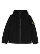 Giacca con cappuccio per bambino Stone Island Junior nero impermeabile - Rubino Kids