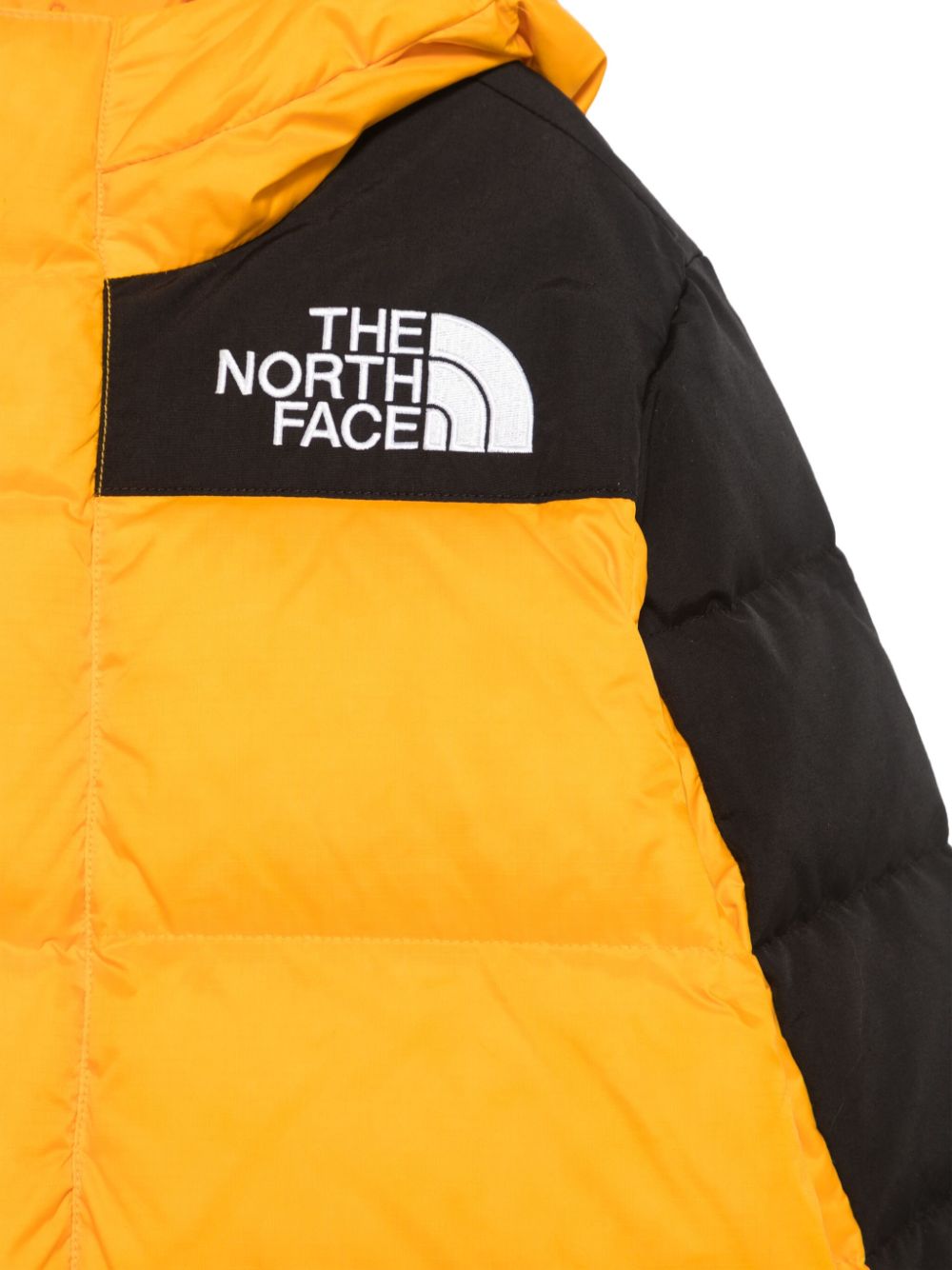 Giubbino Himalayan per bambino The North Face Kids giallo con colletto rialzato - Rubino Kids