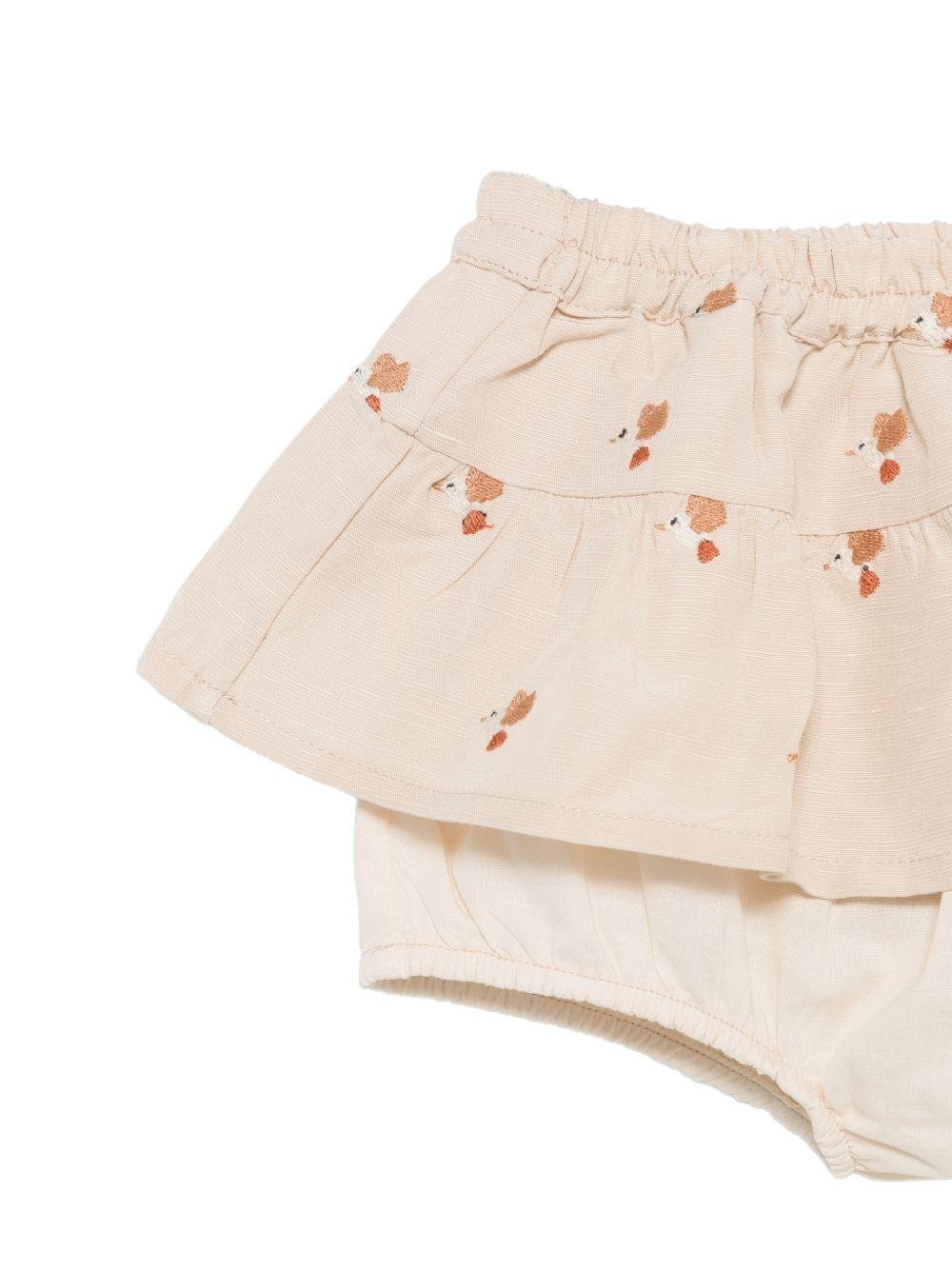 Gonna per neonata Donsje beige con ricamo uccellini all - over - Rubino Kids