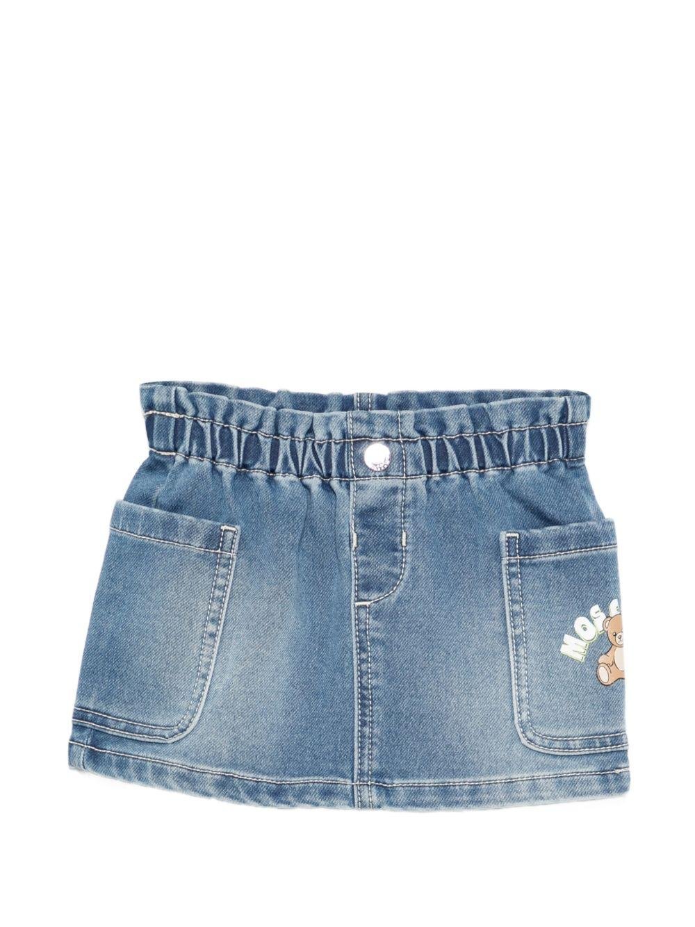 Gonna per neonata Moschino Kids denim con logo sul davanti - Rubino Kids