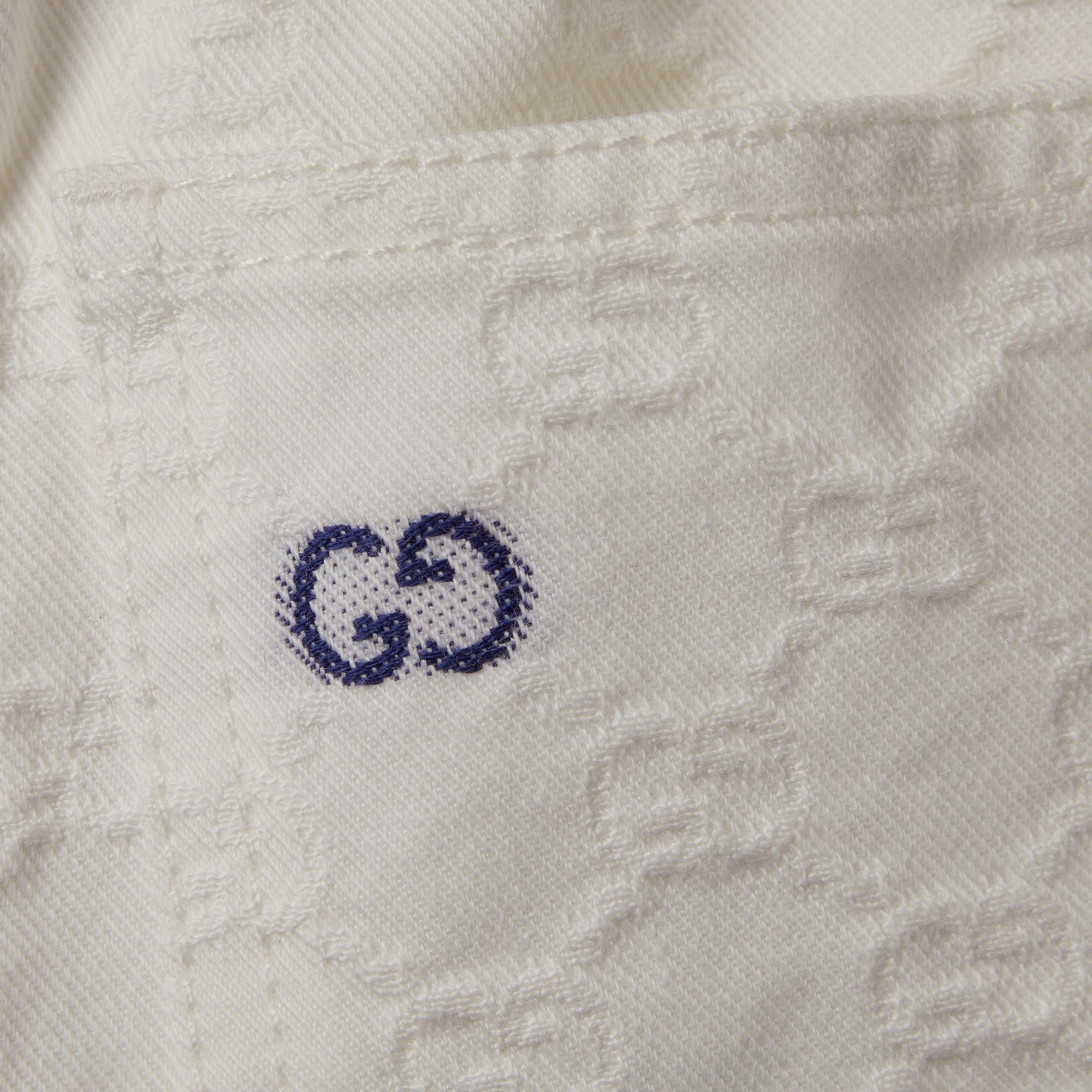 Shorts per neonato Gucci Kids bianchi con logo GG all-over 848984XDDFC 9066 GUCCI KIDS 