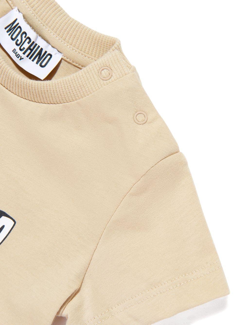T-shirt per neonati Moschino Kids beige con logo sul davanti MUM04PLAA03 20829 MOSCHINO KIDS 