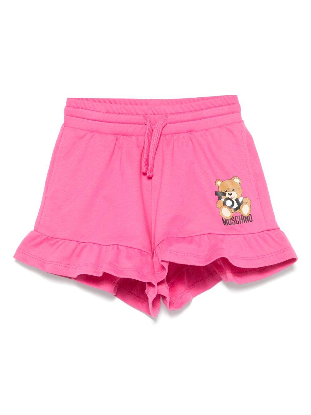 Shorts con stampa Leo Teddy per bambina Moschino Kids fucsia con due tasche laterali HAQ014LCA19 50533 MOSCHINO KIDS 