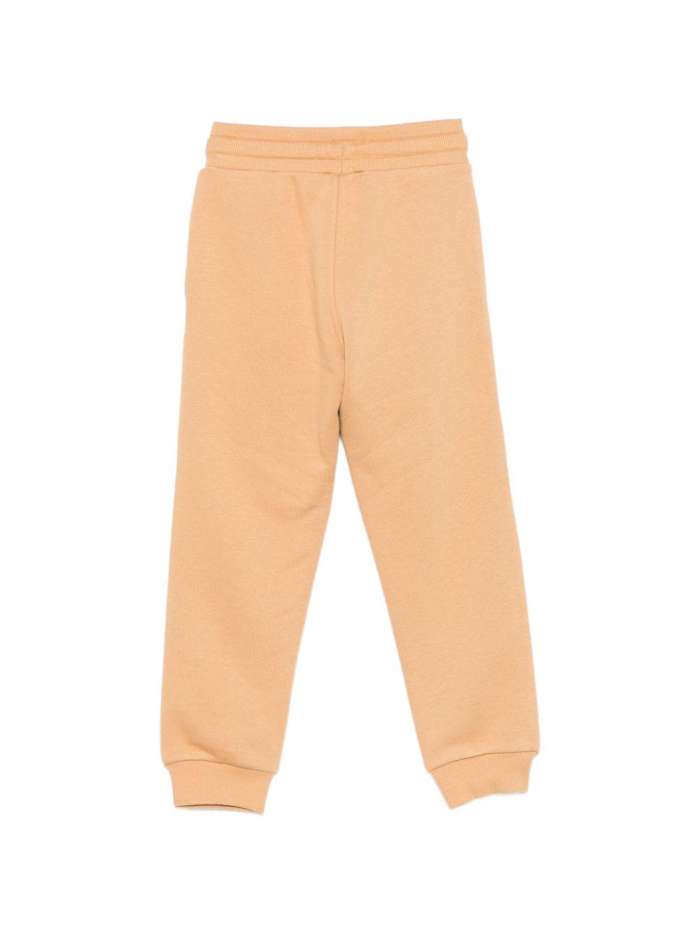 Pantaloni sportivi per bambino Timberland Kids beige con logo sulla gamba T60974 230 TIMBERLAND KIDS 