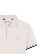 Polo per bambino Boss Kidswear beige con bordi a contrasto J52958 21C BOSS KIDS 