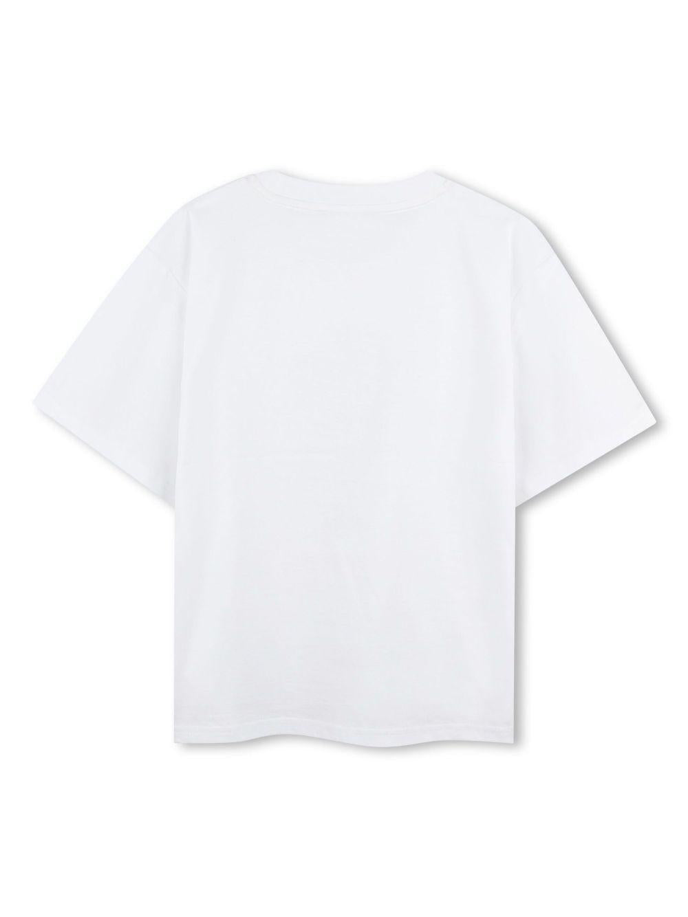 T-shirt per bambina Dkny Kids bianco con stampa con slogan frontale D62307 10P DKNY 