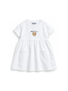 Abito per neonata Moschino Kids bianco con dettaglio orsetto MDV0DGLCA19 10101 MOSCHINO KIDS 