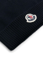 Berretto per neonato Moncler Enfant blu con ricamo toppa con logo sul davanti L19513B00006M2861 742 MONCLER KIDS 