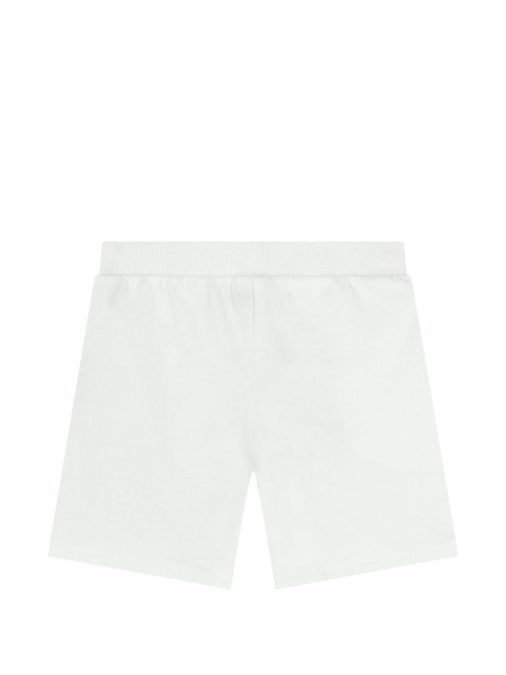 Shorts per neonato Moschino Kids bianchi con tre Teddy Bear MUQ01ULAA17 10101 MOSCHINO KIDS 