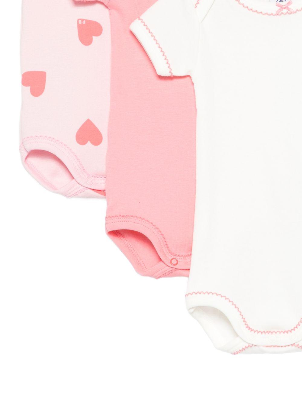 Set di tre tutine per neonata Petit Bateau rosa con design diversi A0FOK 00 PETIT BATEAU 