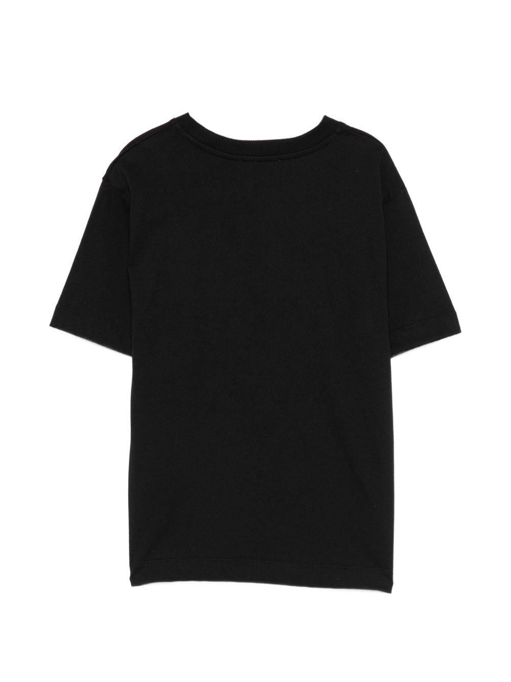 T-shirt per bambini Moschino Kids nera con stampa grafica HRM05WLAA10 60100 MOSCHINO KIDS 