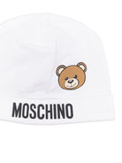 Cappello per neonato Moschino Kids bianco con stampa logo e Teddy Bear MUX05ALBA00 10101 MOSCHINO KIDS 