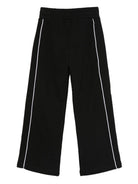 Pantaloni per bambina Off-White Kids neri con righe laterali bianche OBCJ007F25FLE001 1001 OFF WHITE KIDS 