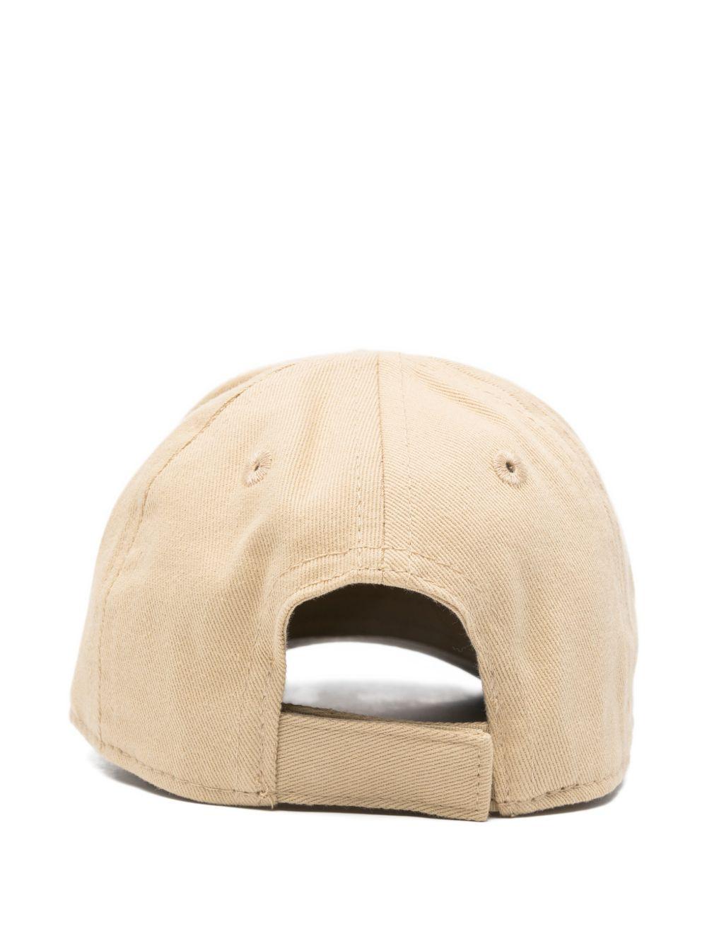 Cappello per neonato Boss Kids beige con logo sul davanti J53142 249 BOSS KIDS 