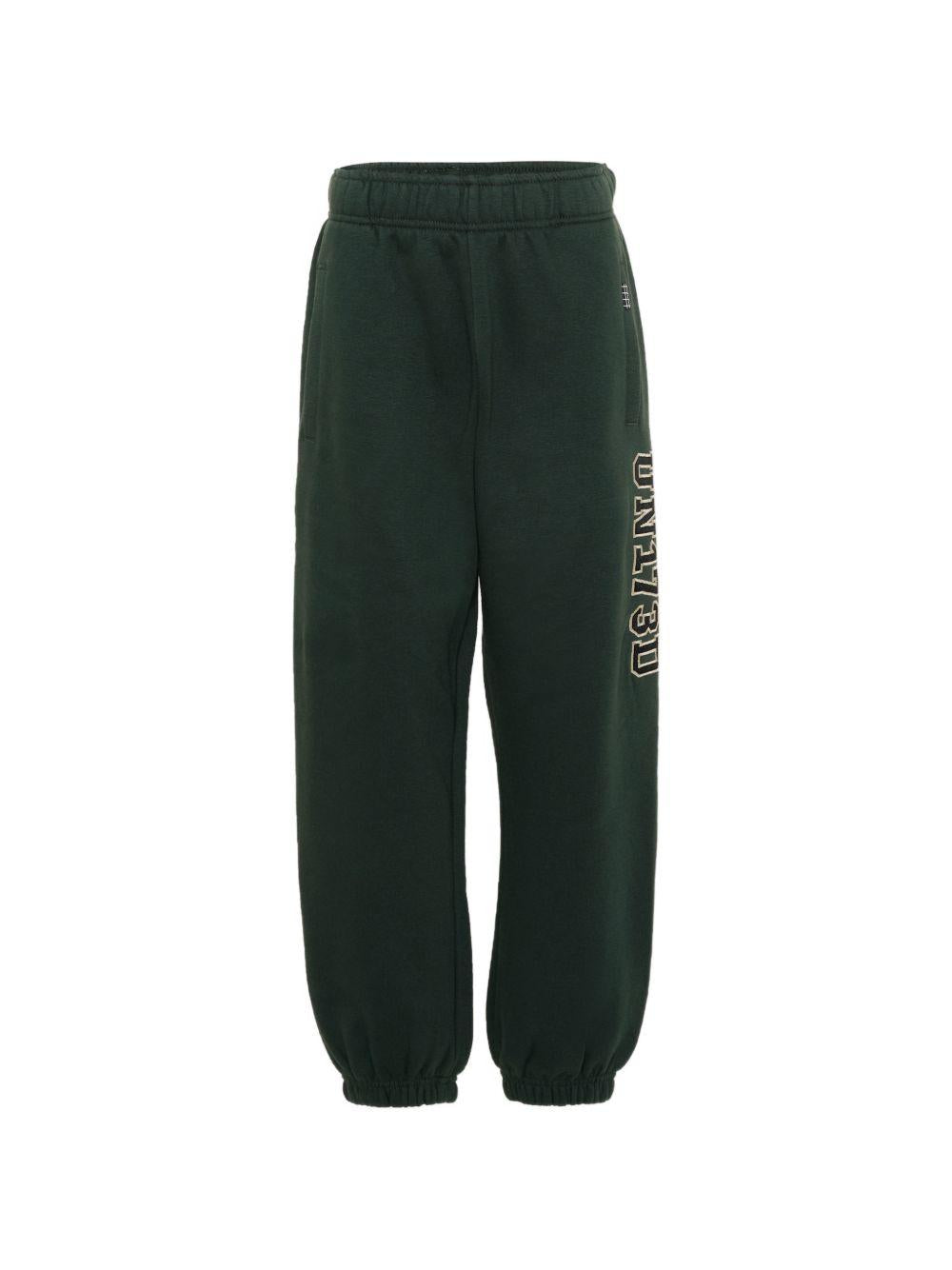 Pantaloni sportivi per bambino Molo Kids verdi con stampa grafica sul lato 1W26I201 5721 MOLO KIDS 