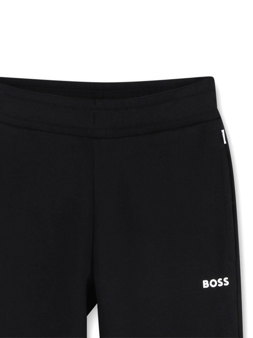 Tuta sportiva per bambino BOSS Kidswear nero con dettaglio logo J52403 09B BOSS KIDS 