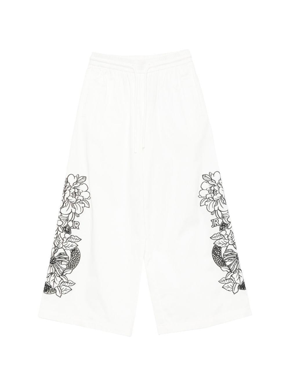 Pantaloni per bambina Jhon Richmond bianchi con stampa floreale RGP26127PA WHITE JOHN RICHMOND JUNIOR 